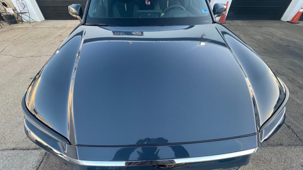 Glossy hood of a 2026 Toyota Grand Highlander after liquid paint protection film at Sandman's Auto Detailing, Norfolk VA